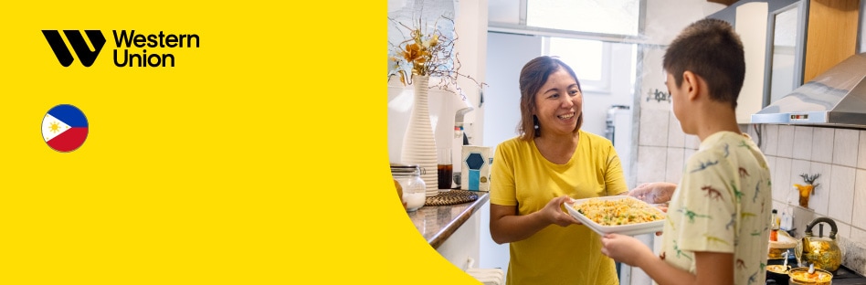 Mother and son cooking together with a Western Union logo