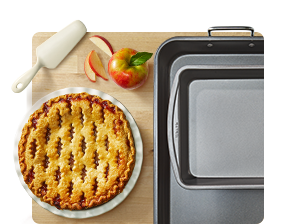 Roasting pans and pie in ceramic dish.