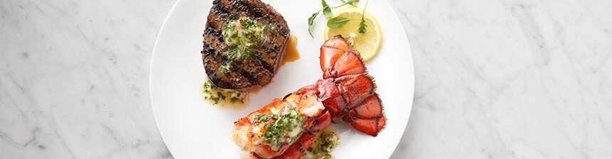 Grilled Filet Mignon and Lobster Tail with Herbed Butter Recipe