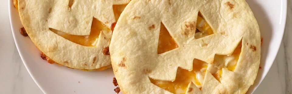 Jack-O-Lantern Quesadillas on a plate
