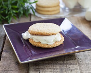 smore on purple plate on wooden table smore on purple plate on wooden table
