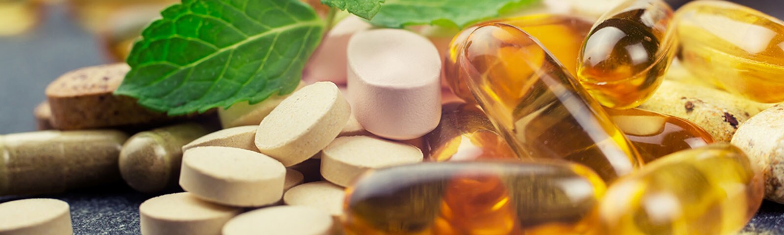 Pile of multivitamins on a table Pile of multivitamins on a table