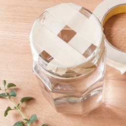 use strips of masking tape to make a square grid across the opening