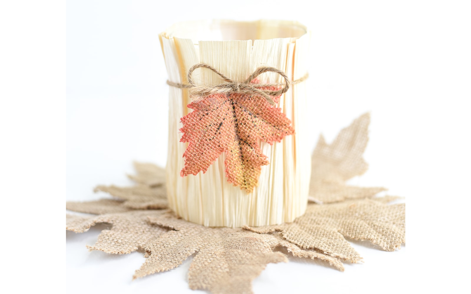 DIY vase made using a cornhusk and faux leaves