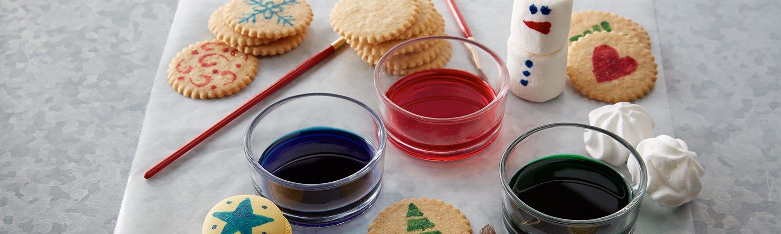 Painting with paint brushes on cookies Painting with paint brushes on cookies